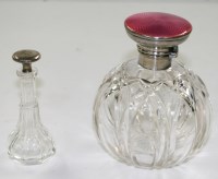 Lot 599 - A George V cut glass scent bottle, with silver...