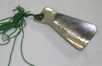 Lot 620 - An Elizabeth II novelty shoe-horn, by John...