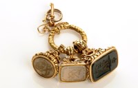 Lot 621 - Three gold 19th Century fobs, to include: one...