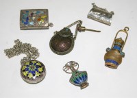 Lot 655 - Three gilt and white metal pendant scent...