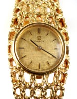 Lot 682 - An 18ct. gold lady's Omega cocktail watch, the...