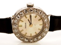 Lot 718 - A lady's 18ct. gold cased cocktail watch, by...