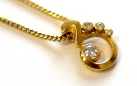 Lot 729 - A diamond and 18ct yellow gold pendant, the...