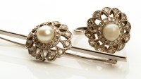 Lot 744 - A pearl and diamond cluster ring, the central...