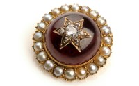 Lot 745 - A garnet, diamond and pearl brooch, the garnet...