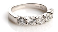 Lot 760 - A five stone diamond ring, each of the...