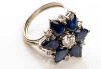 Lot 761 - A sapphire and diamond floral pattern ring,...