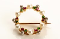 Lot 767 - A circlet brooch, set with cultured pearls,...