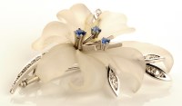 Lot 793 - A diamond, sapphire, glass and white metal...