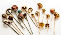 Lot 795 - A collection of stick pins, to include: one...