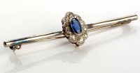 Lot 830 - A sapphire and diamond cluster bar brooch,...