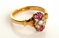 Lot 838 - A ruby and diamond ring, c.1905, the oval...