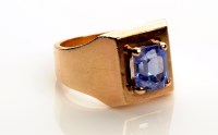 Lot 850 - A tanzanite ring, the emerald cut tanzanite...