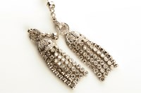 Lot 856 - A pair of diamond pendant earrings, set...