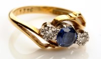 Lot 874 - A sapphire and diamond ring, the circular cut...