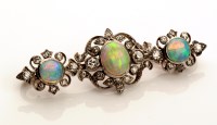 Lot 879 - An Edwardian opal and diamond brooch, the...