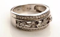 Lot 888 - A diamond dress ring, the central row with...