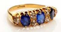 Lot 898 - A sapphire and diamond ring, the three vibrant...