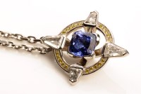 Lot 909 - A tanzanite white diamond and yellow diamond...