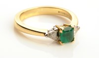 Lot 914 - An emerald and diamond ring, the central...