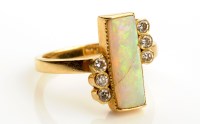 Lot 916 - An opal and diamond ring, the rectangular opal...