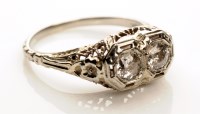 Lot 920 - A two-stone diamond ring, each brilliant cut...