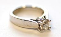 Lot 925A - A lady's diamond ring, the brilliant cut...