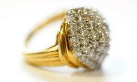 Lot 926 - A lady's diamond ring, set with many brilliant...