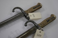 Lot 1054 - Two French sword bayonets for a Chassepot...