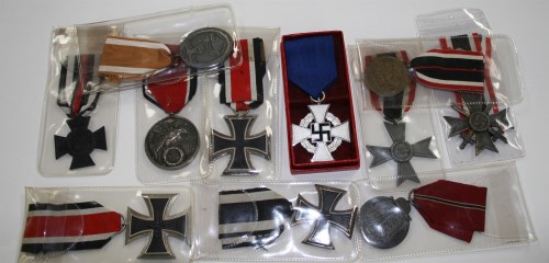 Lot 1070 - A collection of German WWII medals, to include:...