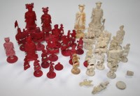 Lot 1158 - An Eastern carved ivory chess set, one side...