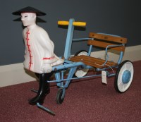 Lot 1159 - A child's pedal operated 'rickshaw' with blue...