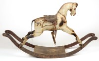 Lot 1177 - A 19th Century painted wooden rocking horse,...