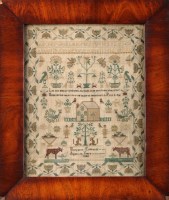 Lot 1179 - A mid 19th Century woolwork sampler, by...