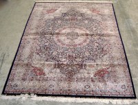 Lot 1200 - A modern fine silk-on-silk Hereke Ipek carpet,...