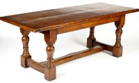 Lot 1231 - A 17th Century style oak refectory table, the...