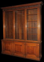 Lot 1248 - A Victorian oak bookcase with a high stepped...