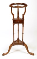 Lot 1262 - A mahogany basin stand, with circular ring top...