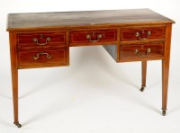 Lot 1268 - An Edwardian mahogany kneehole dressing table,...