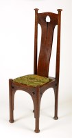 Lot 1282 - An Arts & Crafts oak chair, in the manner of...