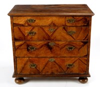 Lot 1287 - An early 18th Century oak chest of four long...