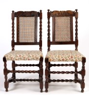 Lot 1289 - A pair of Jacobean style carved and stained...