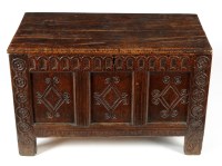 Lot 1294 - A 17th Century carved oak coffer, with plank...