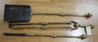 Lot 1320 - A set of three 19th Century brass fire irons...