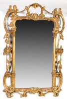 Lot 1324 - An early 19th Century gilt wood rococo wall...