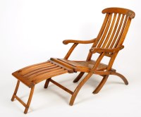 Lot 1329 - A teak 1920's steamer chair, with stick back...