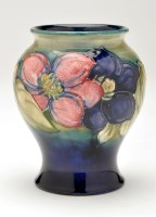 Lot 374 - Moorcroft 'Clematis' inverted baluster vase,...