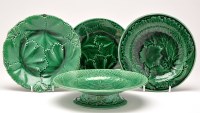 Lot 395 - Fifteen green-glaze plates, with leaf and...
