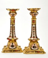 Lot 409 - Pair of Royal Crown Derby 'Imari' candlesticks,...