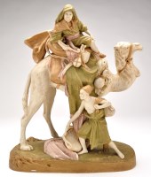 Lot 428 - Royal Dux porcelain camel figure group,...